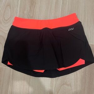 Lorna Jane Black and Orange Tennis Skirt